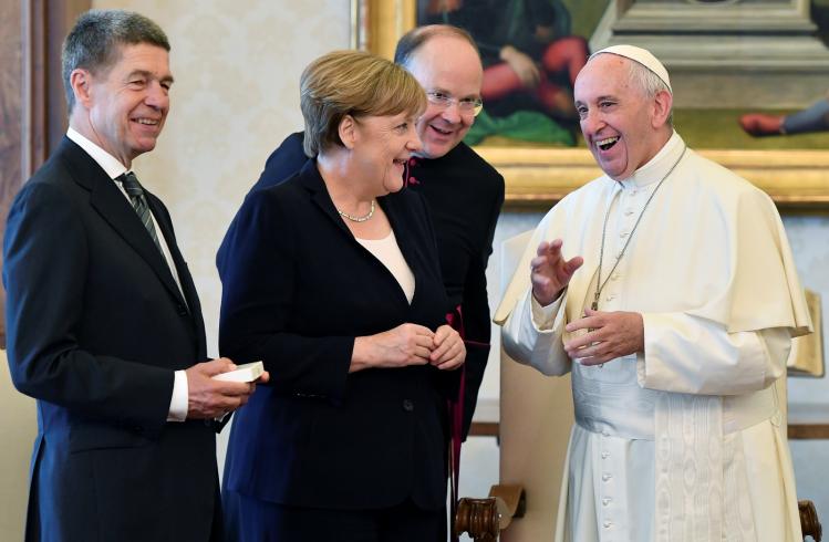 Pope Francis with German Chancellor Angela Merkel and her husband during a private meeting on June 17, 2017 / CNS photo