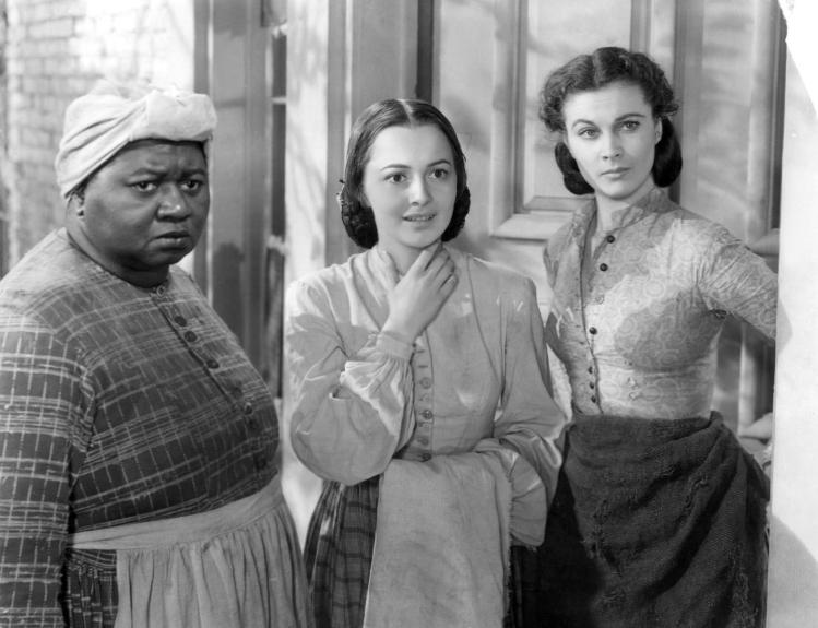 Hattie McDaniel, Olivia de Havilland, and Vivien Leigh in ‘Gone with the Wind’ / Wikimedia