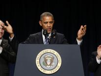 U.S. Sens. Casey and Wicker applaud as President Obama speaks at National Prayer Breakfast in Washington